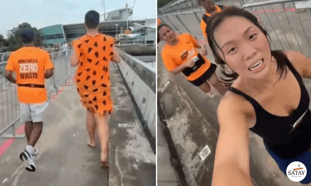 Woman Surprised by Fred Flintstone Lookalike in Barefoot Costume During Singapore Half Marathon